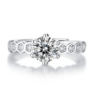 Moissanite ring with hexagonal bezels