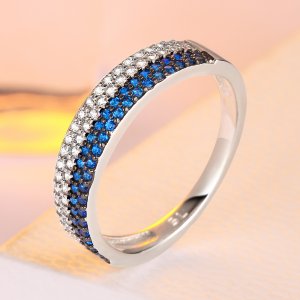 Double pave ring with blue and white zircons