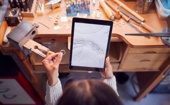 depositphotos_441694006-stock-photo-overhead-view-female-jeweller-comparing